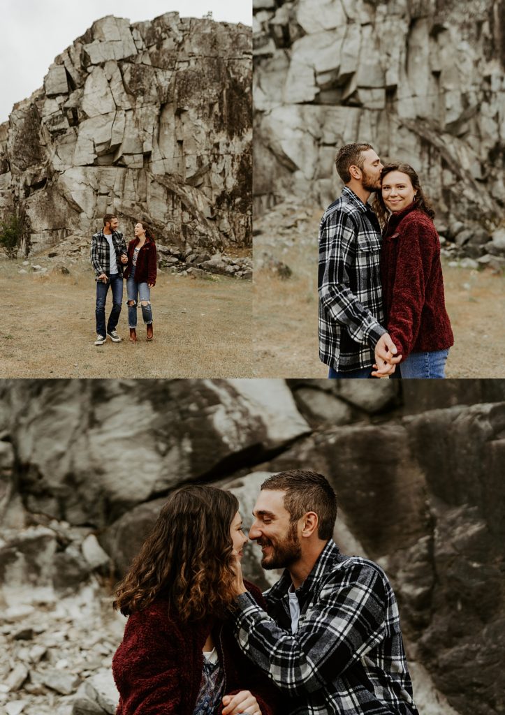 Couple kissing in front of rocks in Oregon