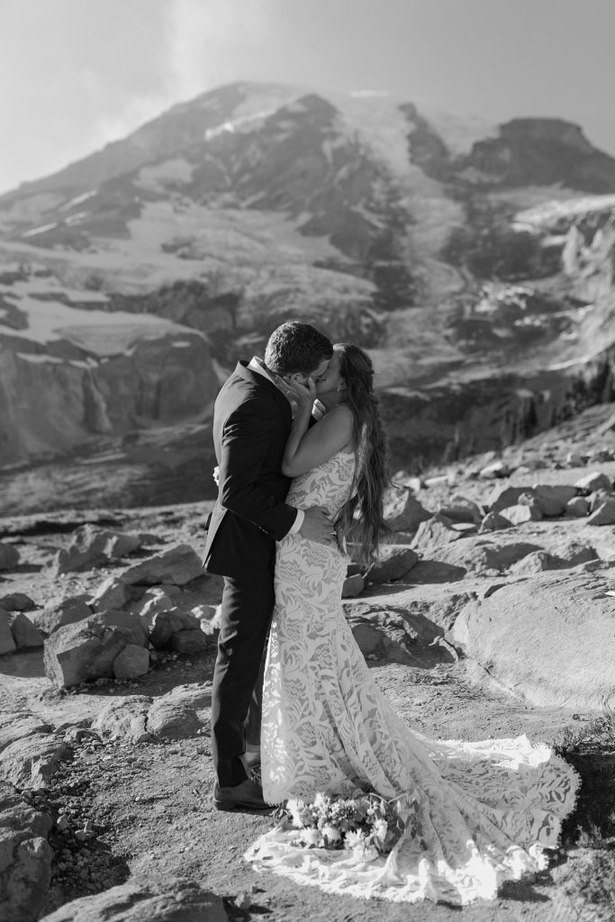 black and white photo of a first kiss at mount rainier