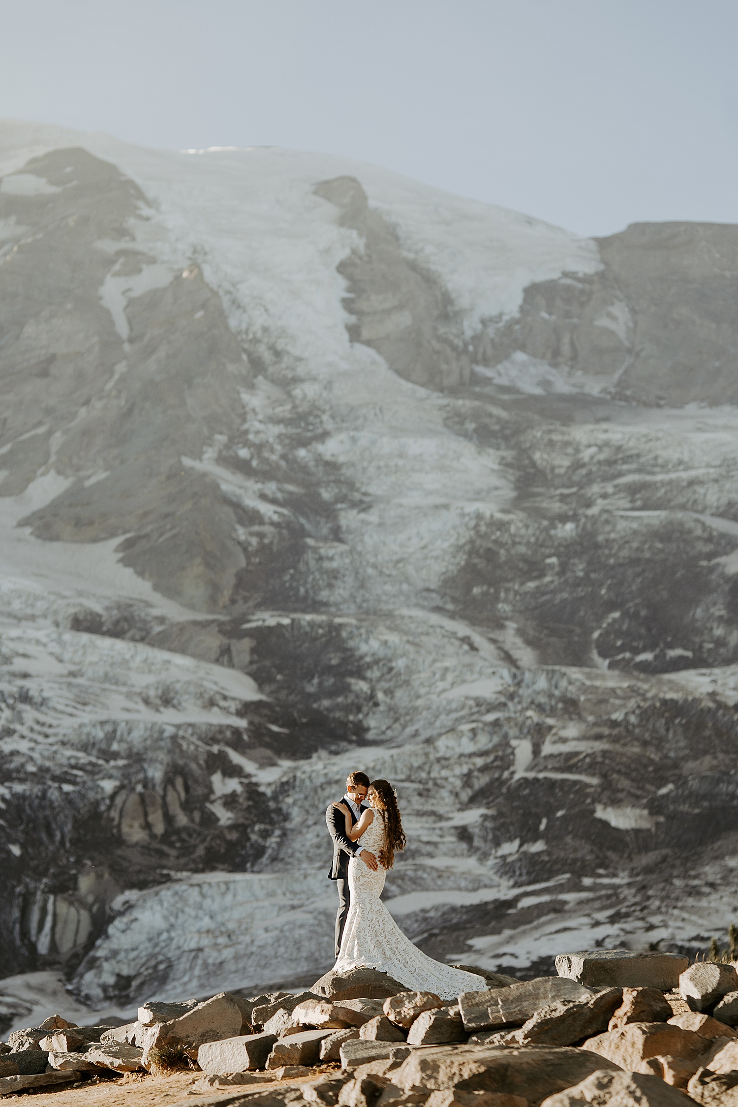 bride and groom photo in front of mount rainier