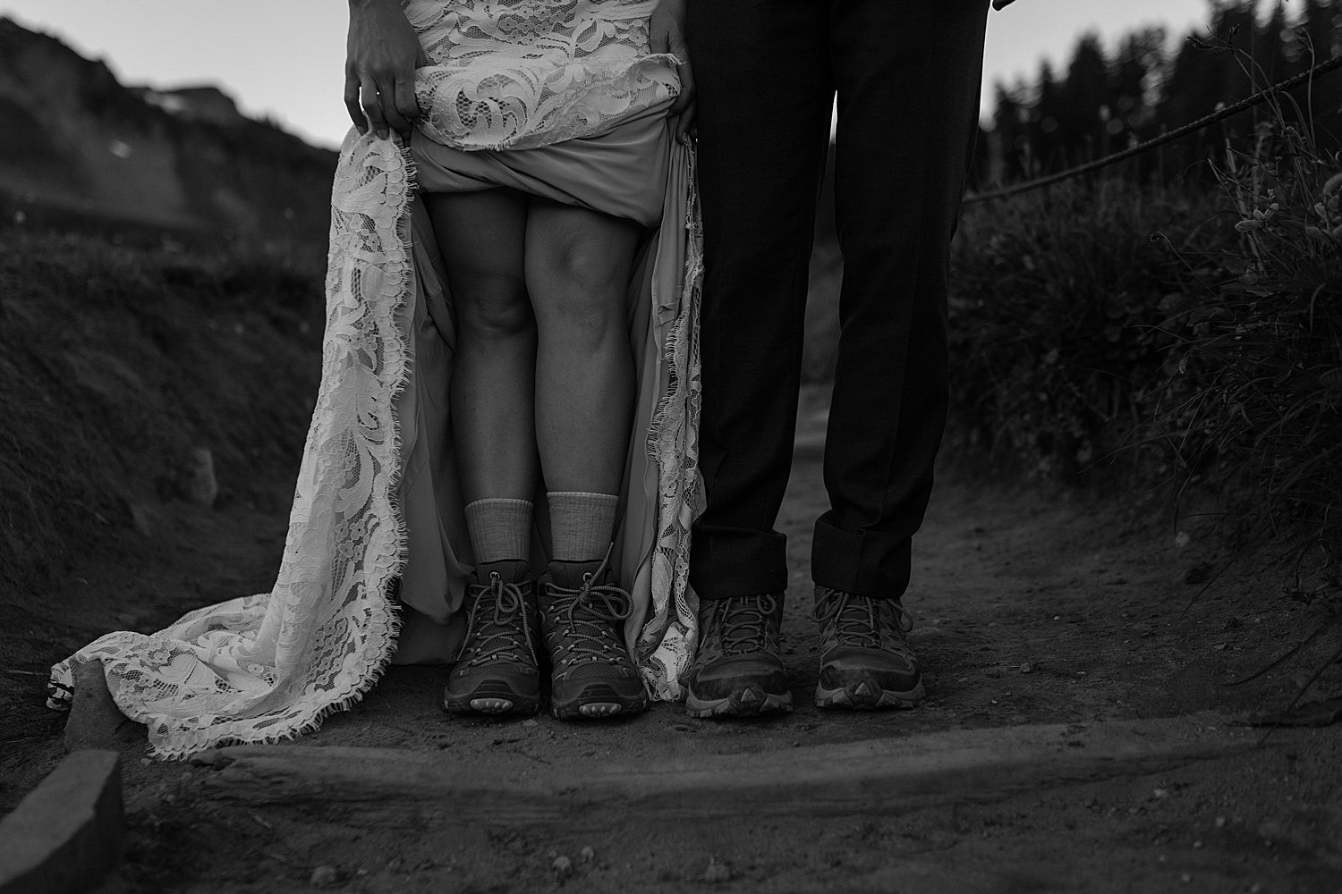 black and white photo of bride and groom's hiking shoes