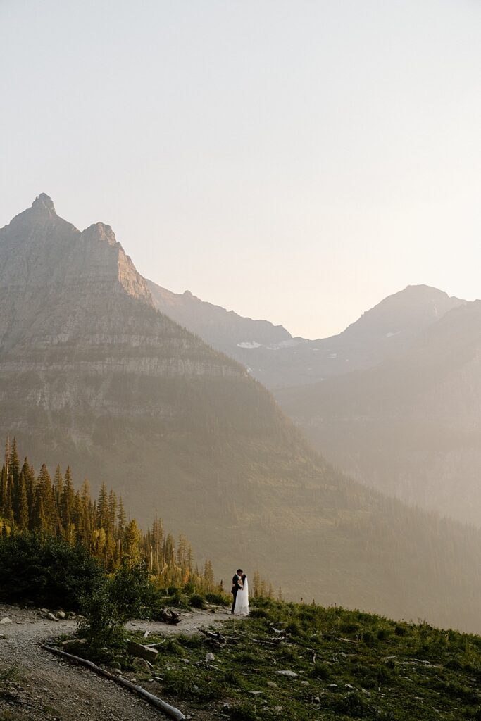 Sunset elopement photo at Big Bend in Glacier National Park, Montana.