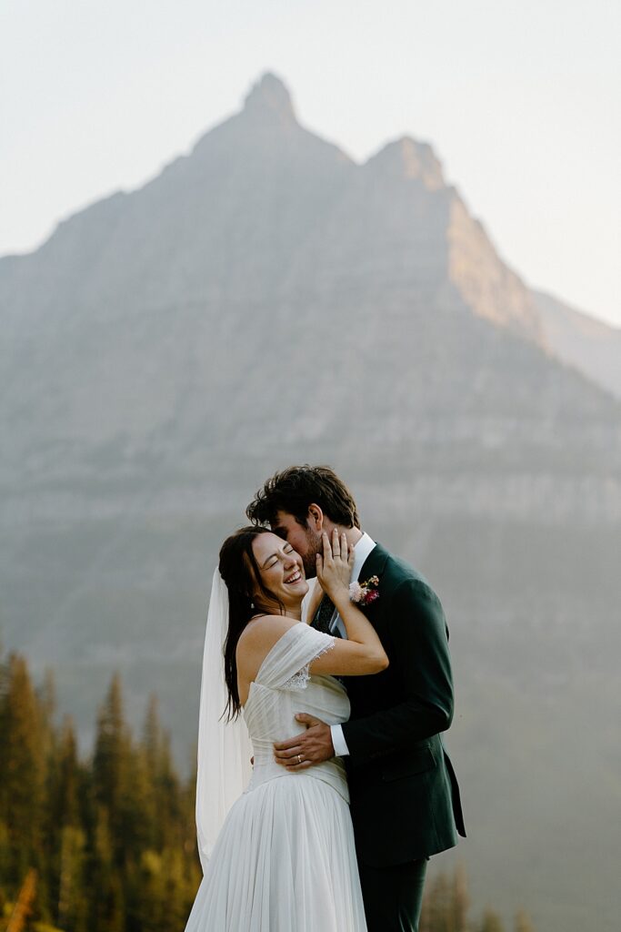 Sunset elopement photo at Big Bend in Glacier National Park, Montana.