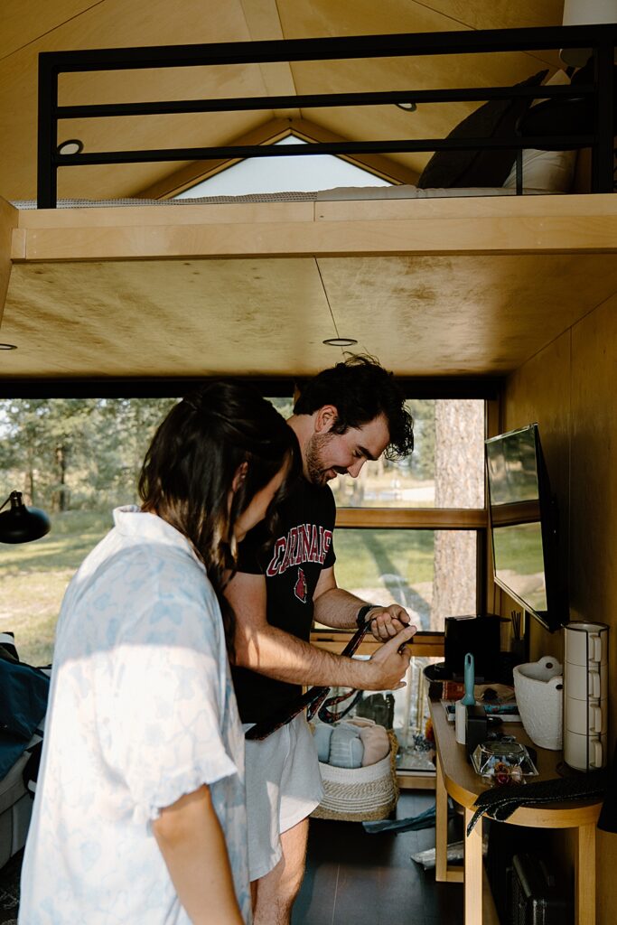 Bride and groom picking out wedding tie