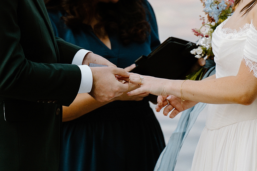 Glacier National Park elopement ceremony with an officiant at 10-mile pullout at Lake McDonald