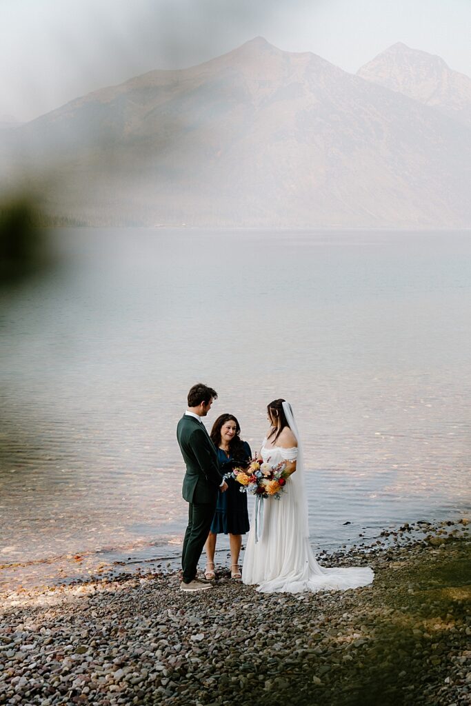Glacier National Park elopement ceremony with an officiant at 10-mile pullout at Lake McDonald