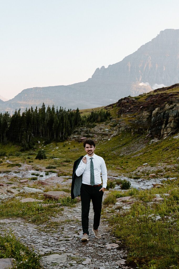 Glacier Park groom portrait at Logan Pass
