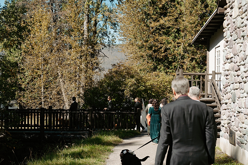 wedding party walking to Lake McDonald Lodge Beach