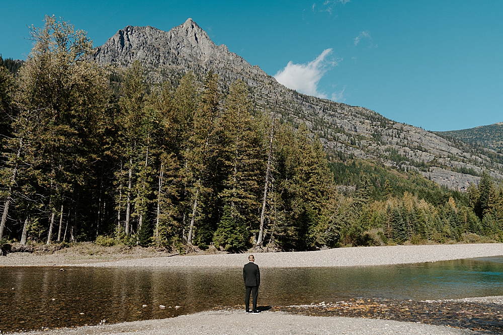 Groom waiting for his bride at Avalanche Creek