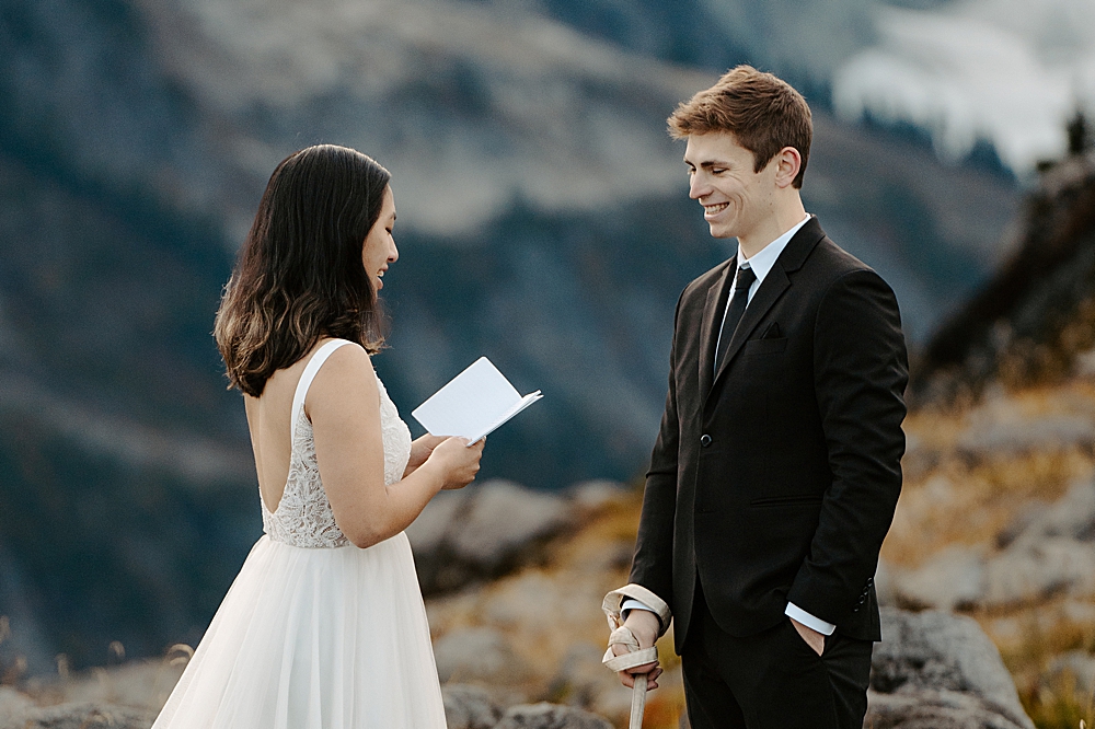 Bride saying elopement vows to groom at their PNW elopement.
