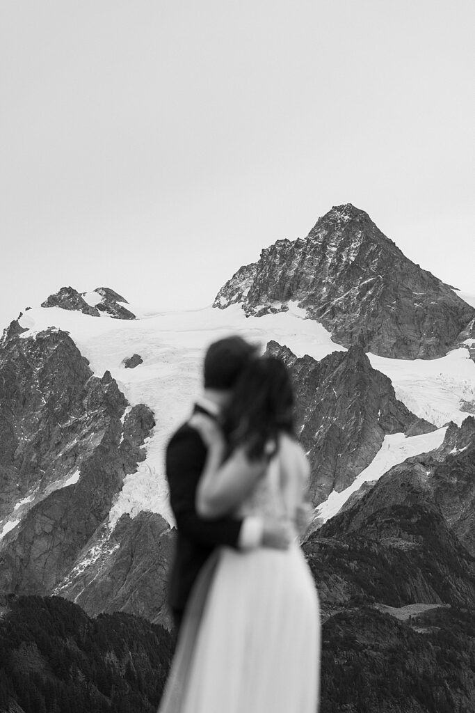 Black & white Artist Point elopement photo with the mountain in focus.