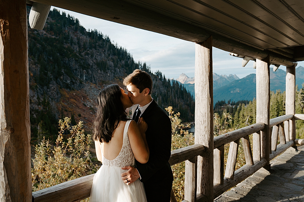Bride and groom kissing at Heather Meadows Visitor Center for their Artist Point elopement.